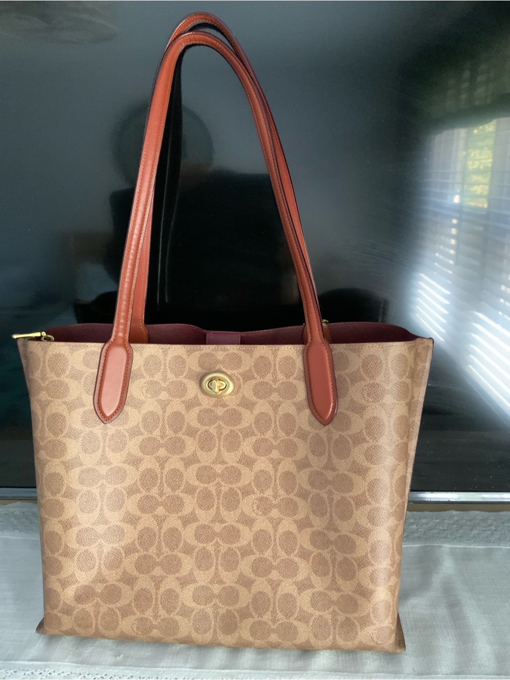 Coach Tan Signature Canvas Tote with Saddle Brown Leather Handles